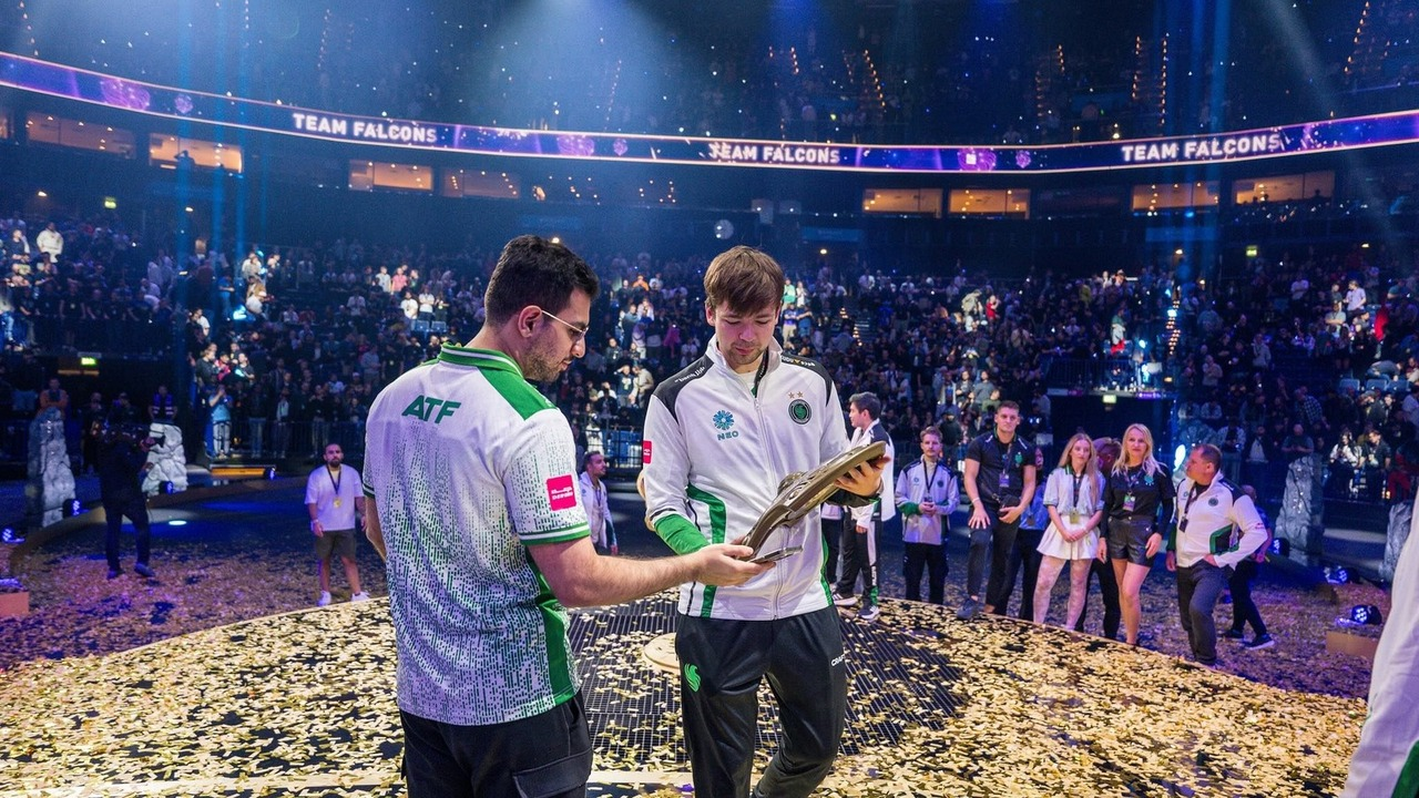 Cr1t speaks on stage at a Dota 2 tournament